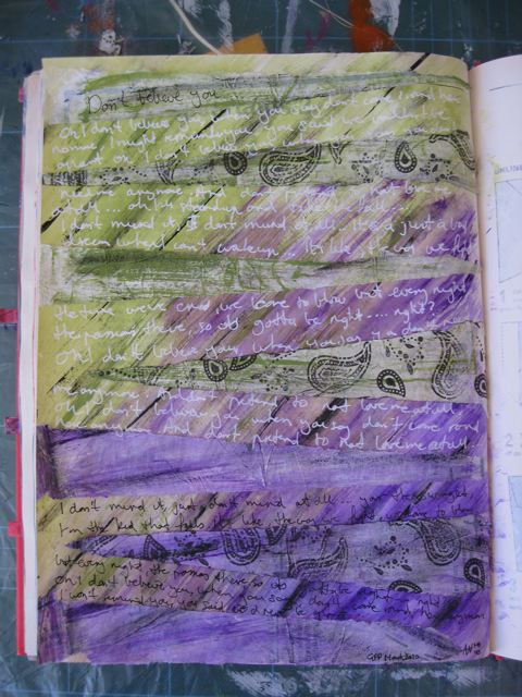 Writing added with gel pens onto art journal