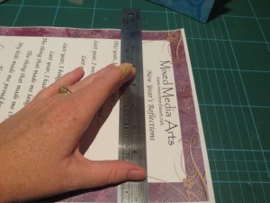 use a ruler to tear out the art journal promtps