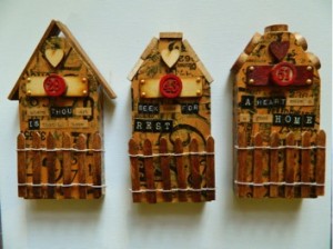 Three Mini altered houses by Melanie Statnick