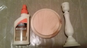 gluing candlestick to base and then to birdhouse