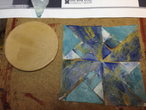 Quilt pattern created in deli paper and encaustic by Vicki Ross