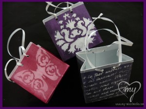 Three examples of the small mixed media gift bag.