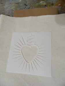 using canvas, burlap, ink and stencils to make a décor pillow for your home or gift