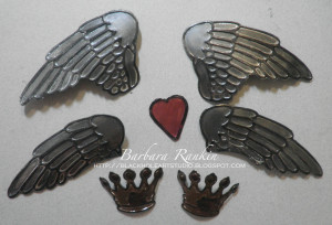 photo of painted metal foil covered cardstock and diecuts