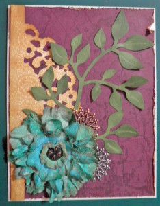 two cards using two of the three flowers