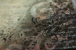 mixed media art background with flourish stamping and calligraphy from mixed media class.