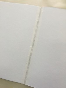 tape spine between signatures